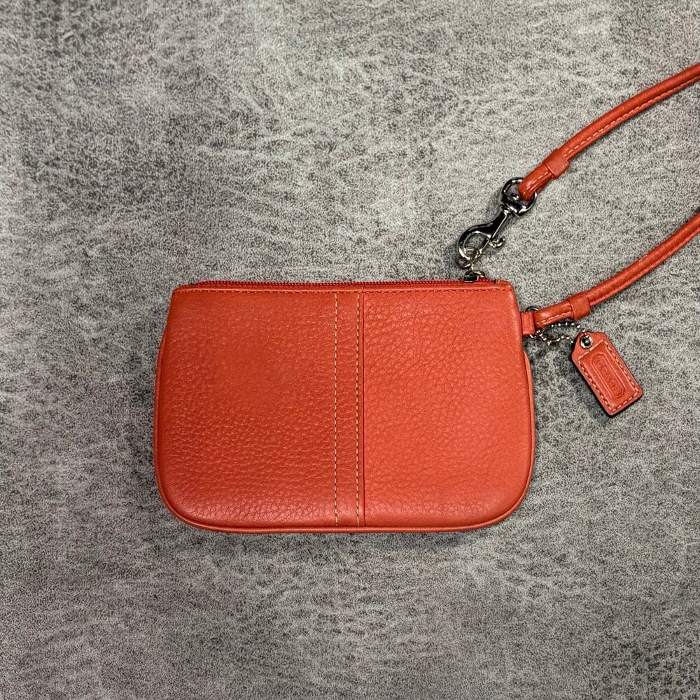 Coach Orange Pebbled Leather Wristlet